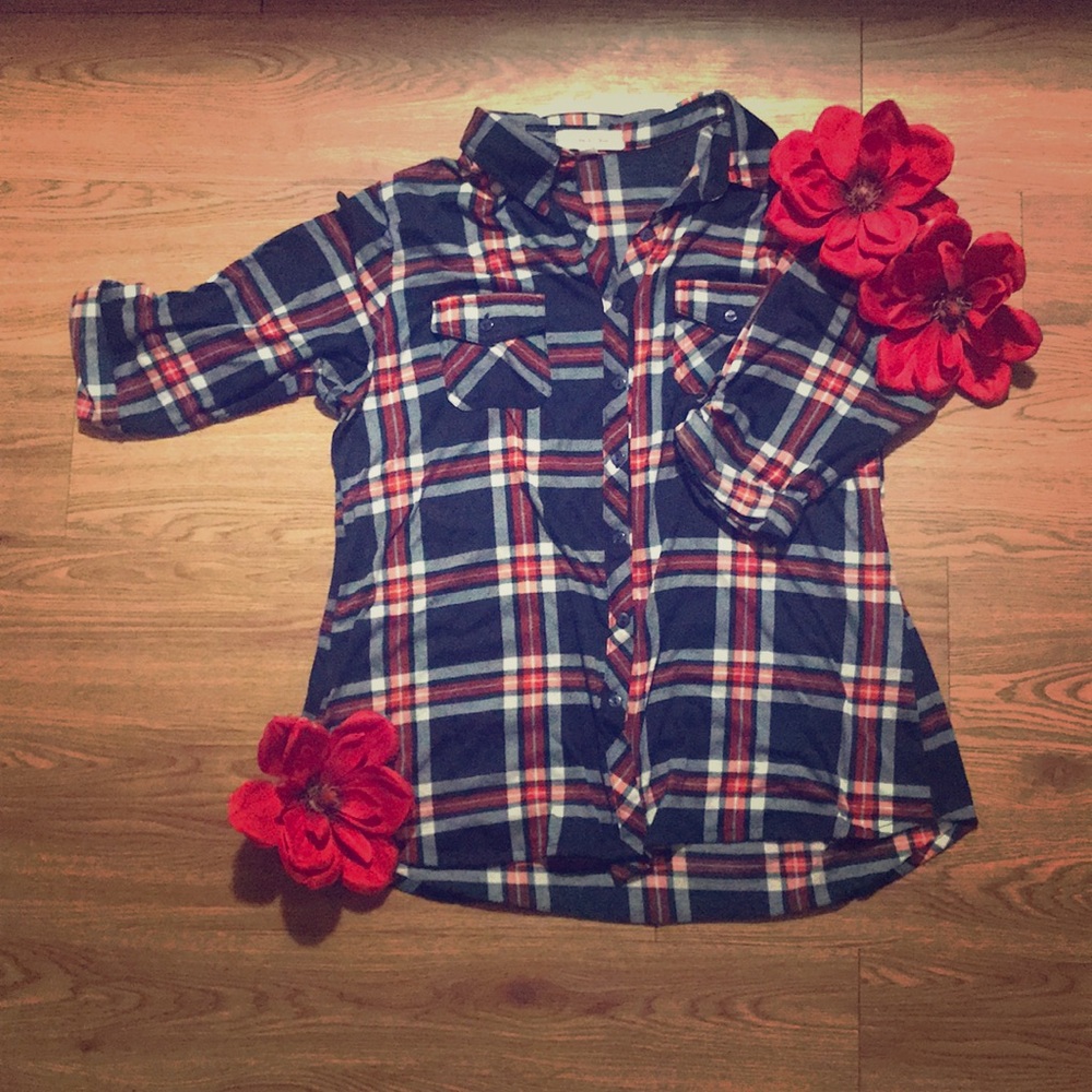 Red, white, and blue flannel shirt.